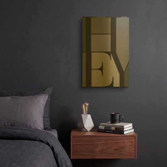 'Hey' By TypeLike Gold Metal Wall Art