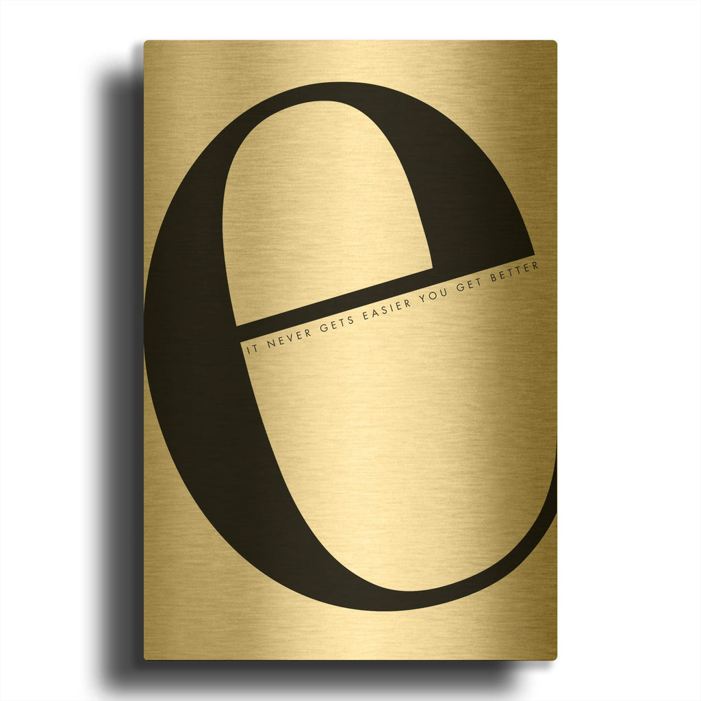 'E is for Easier on White' By Mercedes Lopez Charro Gold Metal Wall Art