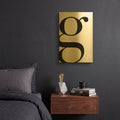 'G is for Good on White' By Mercedes Lopez Charro Gold Metal Wall Art