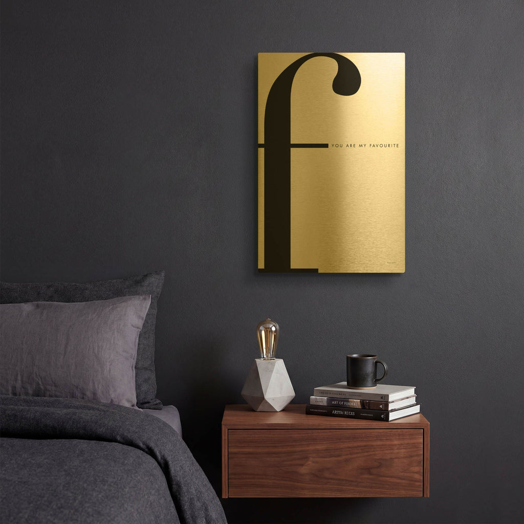 'F is for favorite on White' By Mercedes Lopez Charro Gold Metal Wall Art
