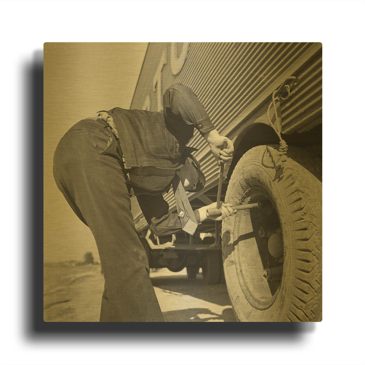 'Changing Tire' By Decent Exposures Gold Metal Wall Art